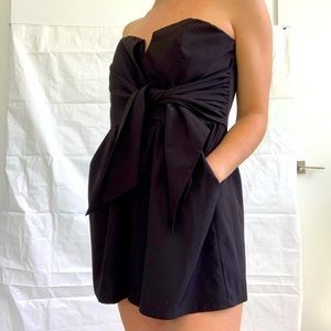 Black strapless bow tie romper